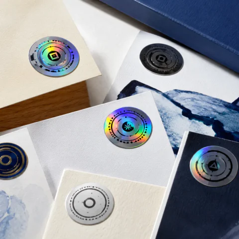 Custom holographic proofmark.art NFC stickers